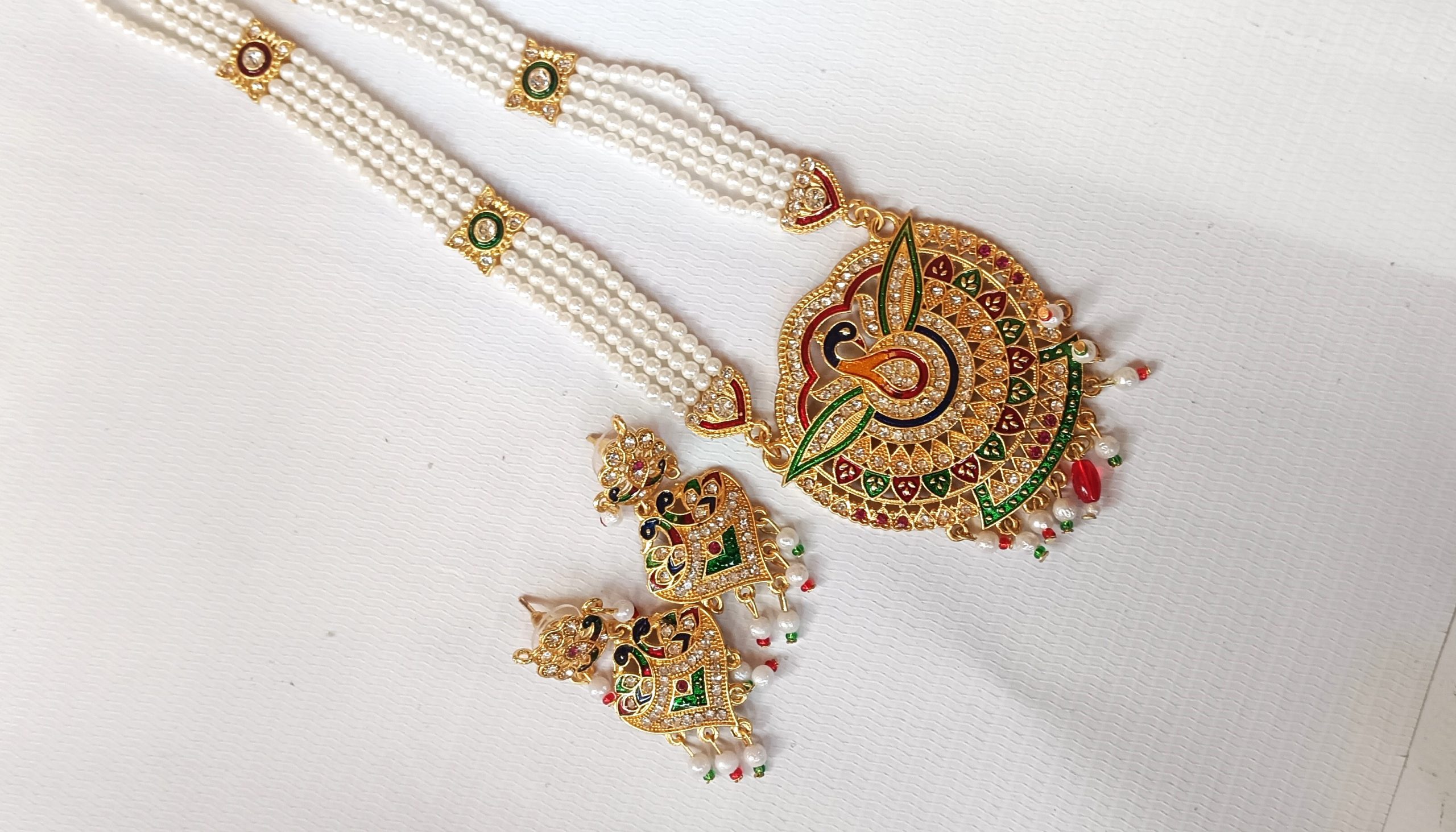 Rajasthani pearl beaded imitation necklace set with a peacock design pendant and matching Earrings. - Image 2