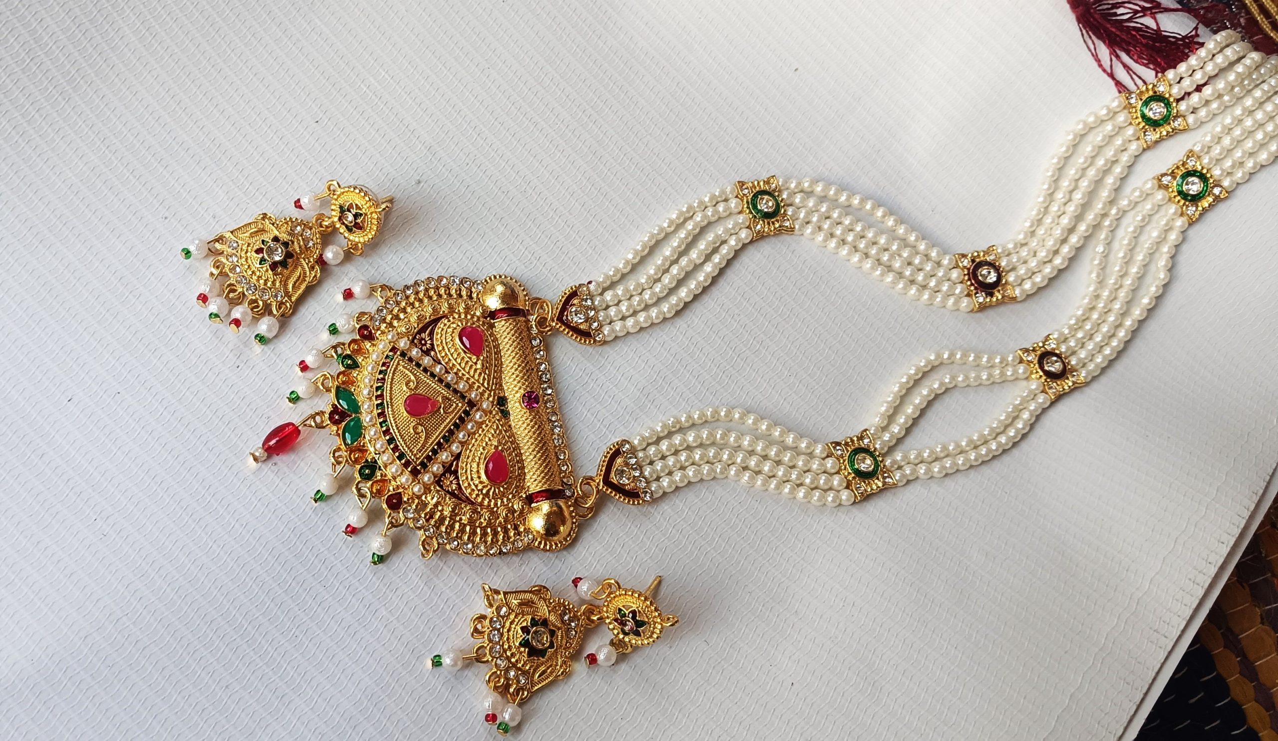 Traditional Rajasthani Pearl Beaded imitation Necklace Set with Round Pendant with Earrings.