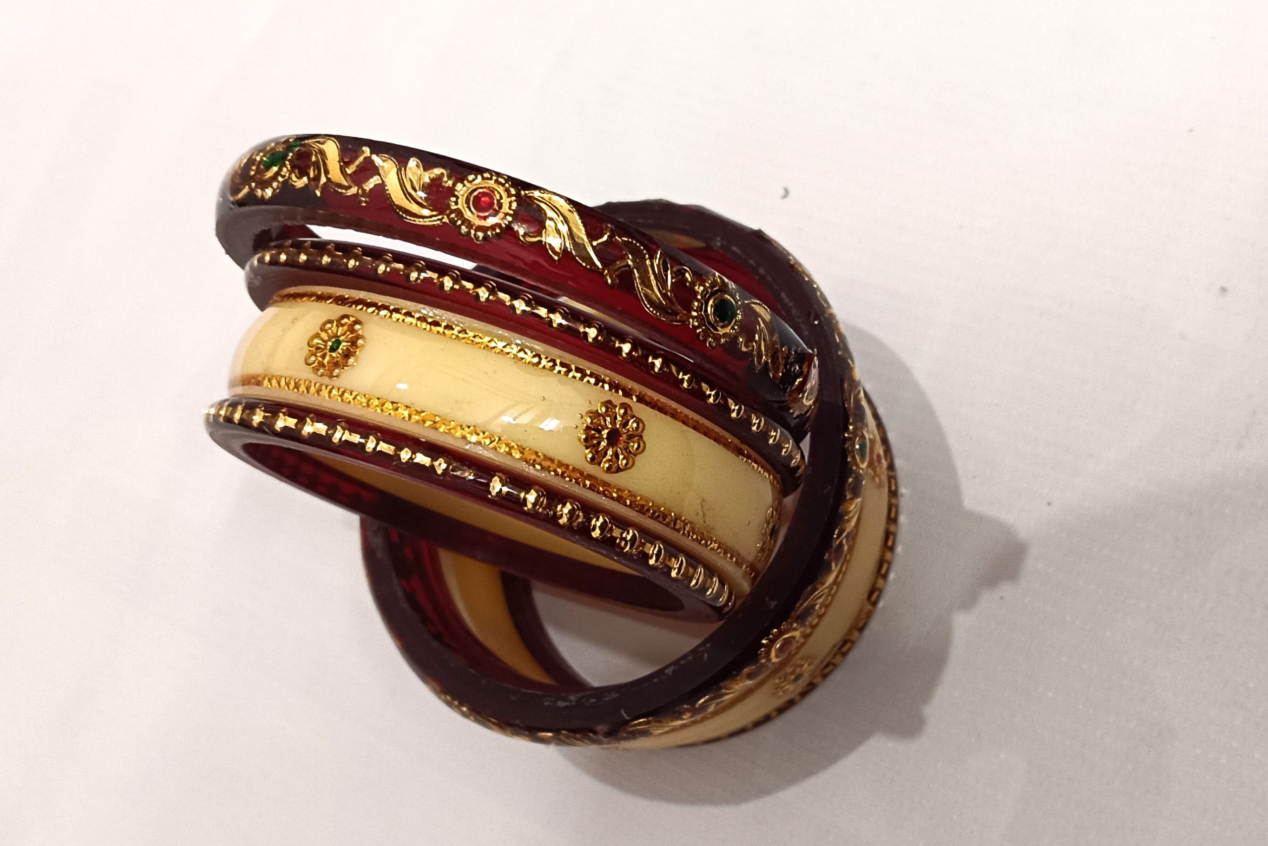 Maroon Acrylic Designer Bangles Set with Golden Floral Design & Stones