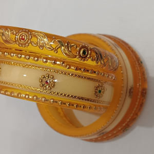Yellow Acrylic Golden Designer Bangles Set with Stone Embellishments