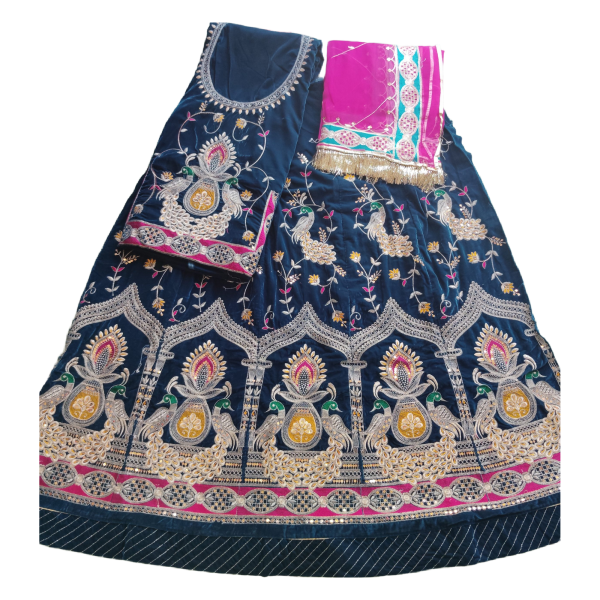 Royal blue velvet peacock poshak with Orange Humrahi Odhna in havey Zari Work.